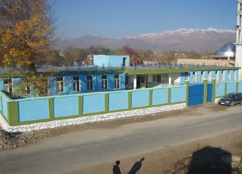 Construction of 8 classroom schools and digging of water wells in image