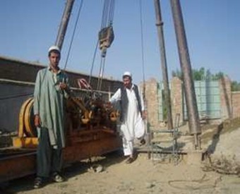 Construction of 8 classroom schools and digging of water wells in